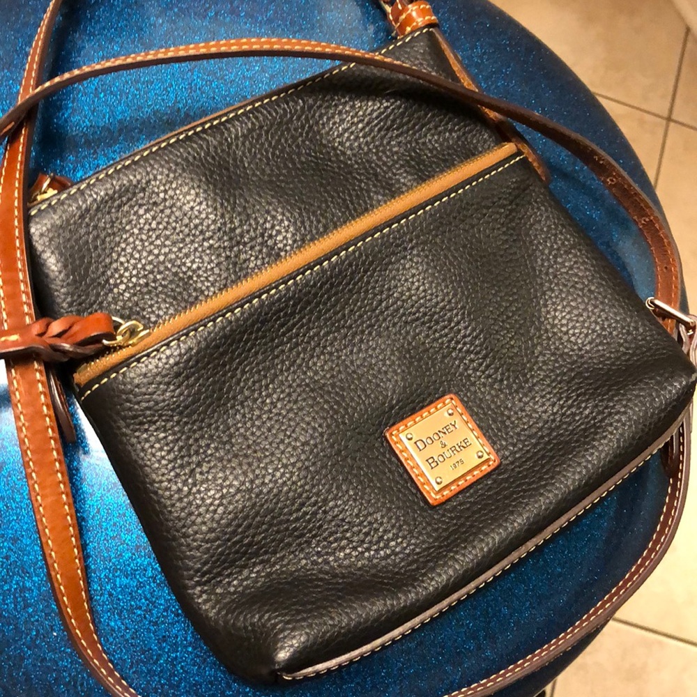 Dooley and Bourke cross body letter carrier.